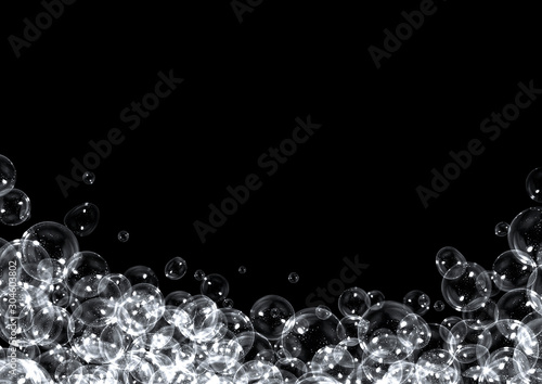 Soap bubbles on black background with copy space