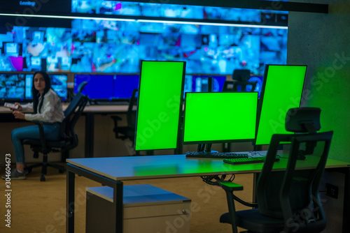 Modern surveilance control room and computer CCTV monitors.