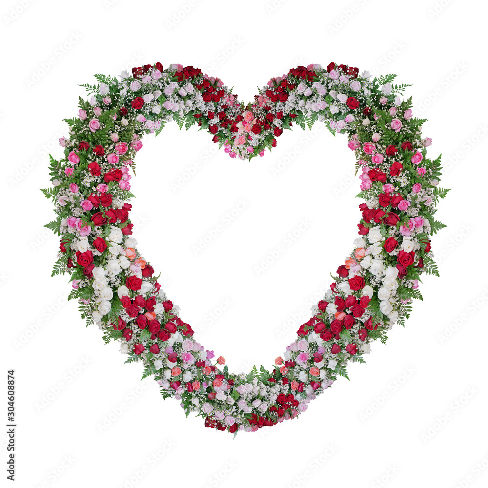 Beautiful heart shaped floral wedding arch with colorful roses flowers and tropical fern leaves, Valentine’s day nature backdrop isolated on white background with clipping path.