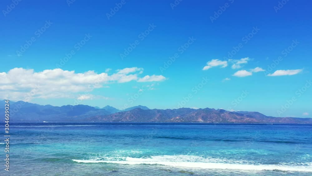 Gorgeous Beach At Singapore With A Beautiful View Of A Bright Blue Sky And A Pure Blue Clean Water - Wide Shot