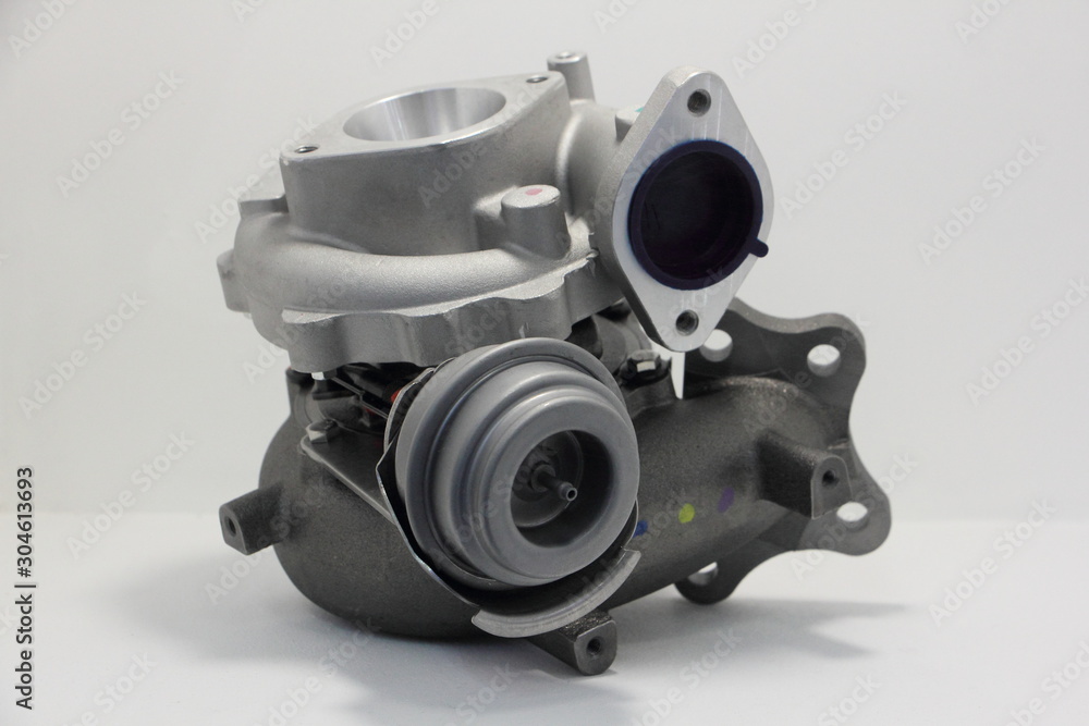 New car turbo kit, motor turbine set with blow off valve close up on white background