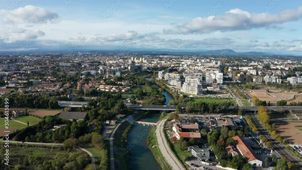 Montpellier Lez river aerial view Port Marianne neighbourhood modern bridge and highway sunny day Montpellier Lez river aerial view Port Marianne neighbourhood modern bridge and highway sunny day