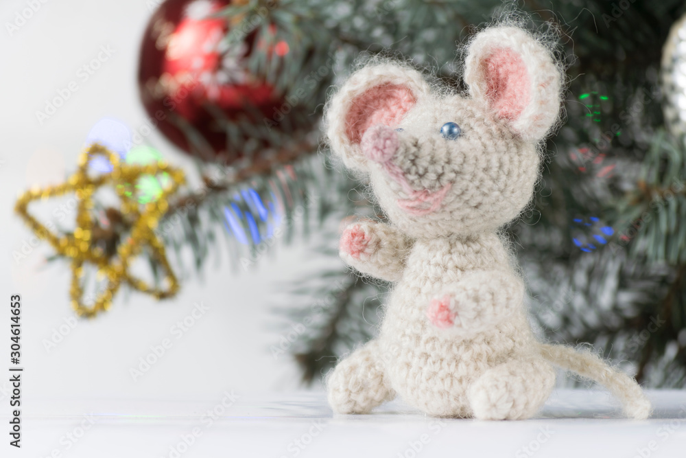Little mouse - a symbol of the new year, knitted do it yourself on the background of the New Year's composition. Little mouse - a symbol of the new year, knitted do it yourself on the background of the New Year's composition.
