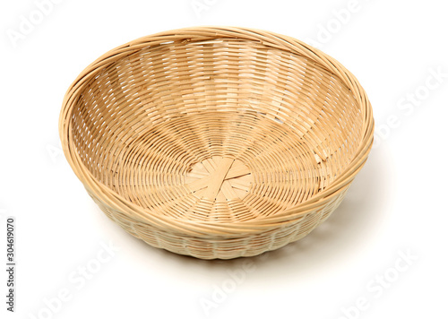 Bamboo basket hand made isolated on white background. Woven from bamboo tray. photo