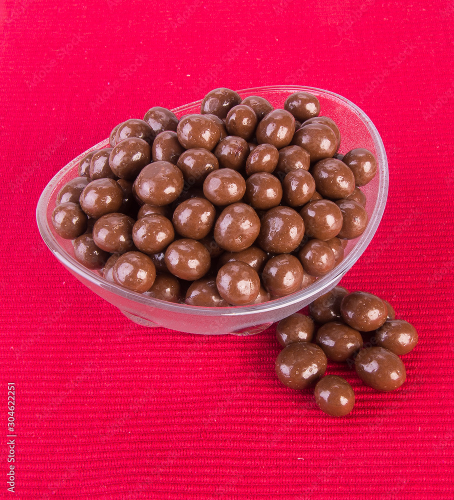 Obraz premium Chocolate ball or chocolate balls in bowl on background new.