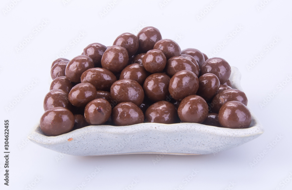Chocolate ball or chocolate balls in plate on background new. Chocolate ball or chocolate balls in plate on background new.