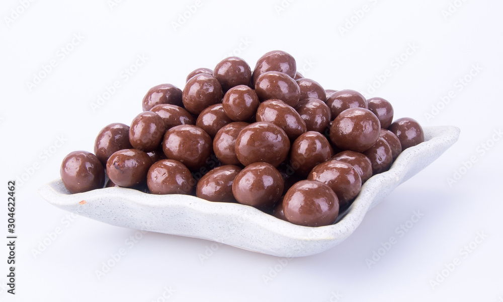 Chocolate ball or chocolate balls in plate on background new. Chocolate ball or chocolate balls in plate on background new.