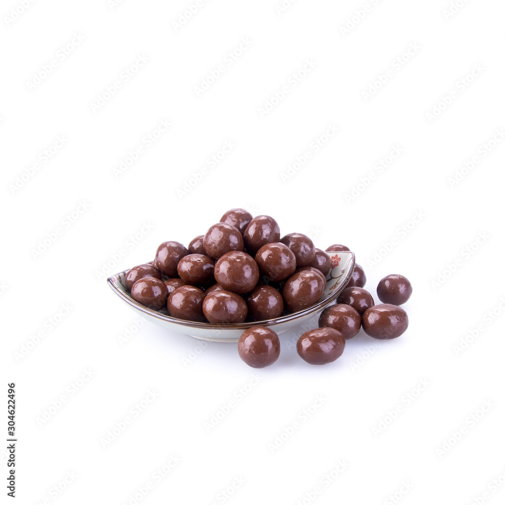 Obraz premium Chocolate ball or chocolate balls in plate on background new.