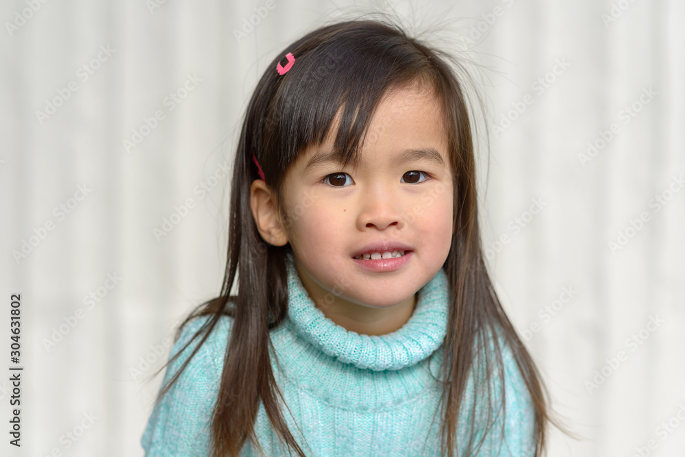 Attractive young girl looking pensively at camera Attractive young girl looking pensively at camera