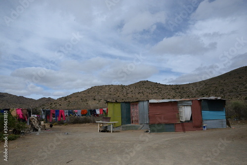 washing on line of colorful house
