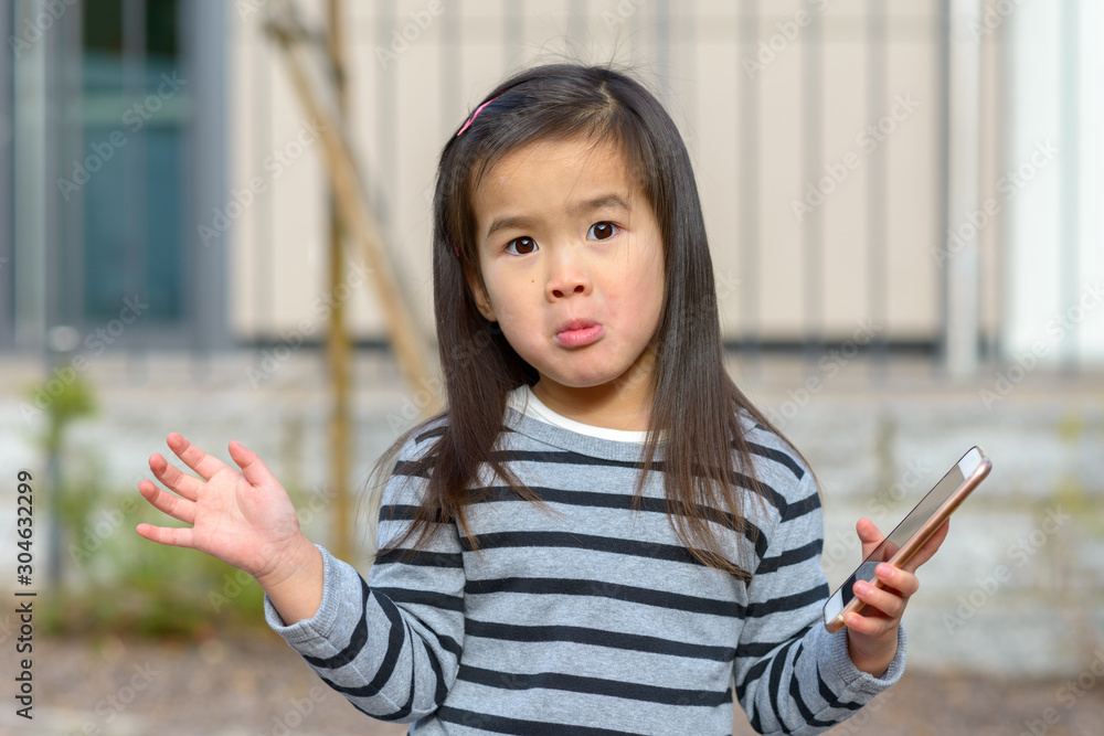 Cute little girl with a sorrowful confused look Cute little girl with a sorrowful confused look