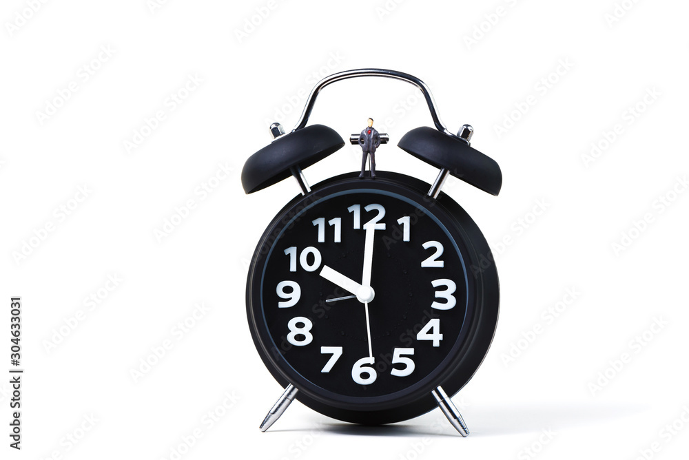 Figure miniature businessman or small people standing with alarm clock, time for business financial concept. Figure miniature businessman or small people standing with alarm clock, time for business financial concept.