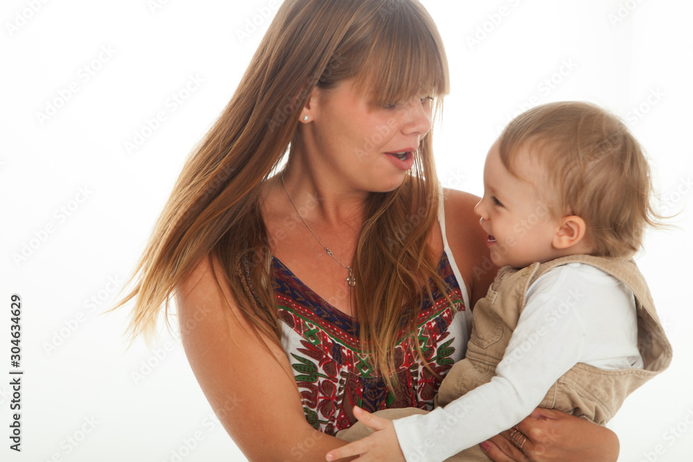 young mom holding and spinning toddler around around, great fun young mom holding and spinning toddler around around, great fun