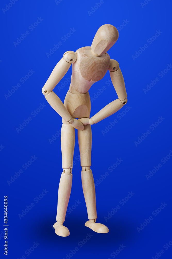 Wooden toy figure of patient - medical concept Wooden toy figure of patient - medical concept
