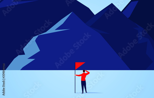 Climbing, businessman holding flag ready to climb the peak