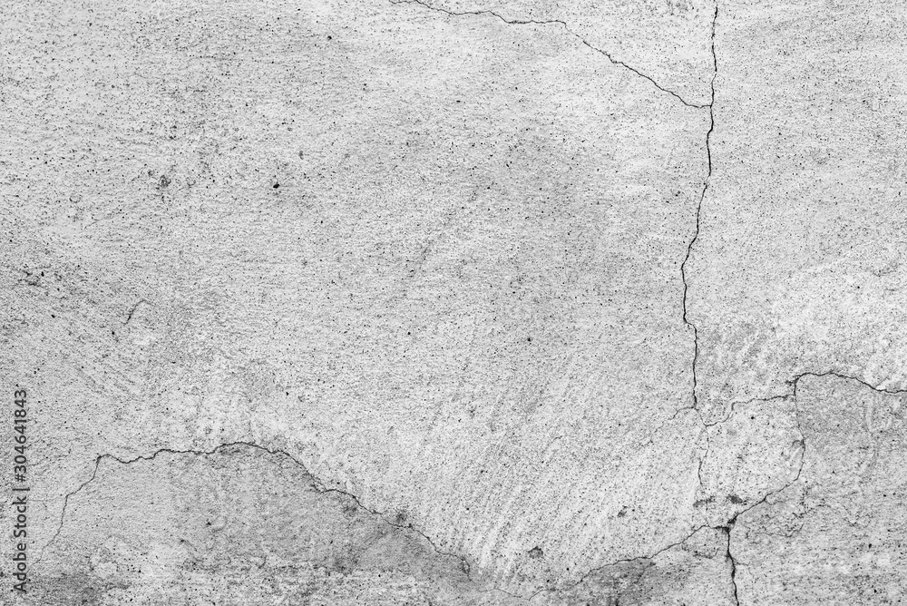 Obraz premium Texture of a concrete wall with cracks and scratches which can be used as a background