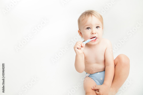 little person brushing his teeth 