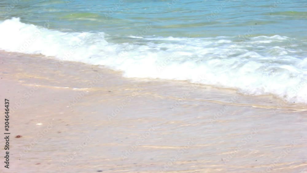 Wave on the sand beach in hot summer day, vacation concept Wave on the sand beach in hot summer day, vacation concept