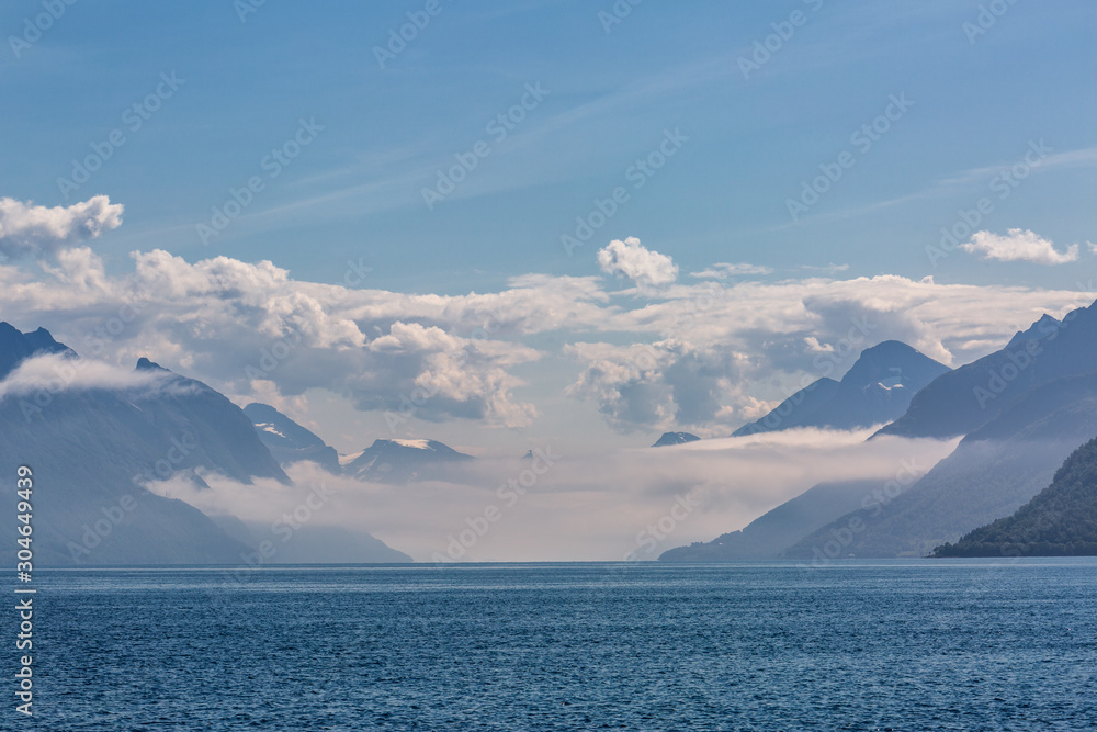 Beautiful landscape with mountains, clouds and sea, Norway
