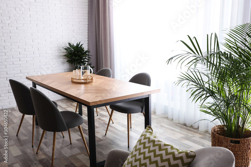 Stylish room interior with green plants. Home decoration