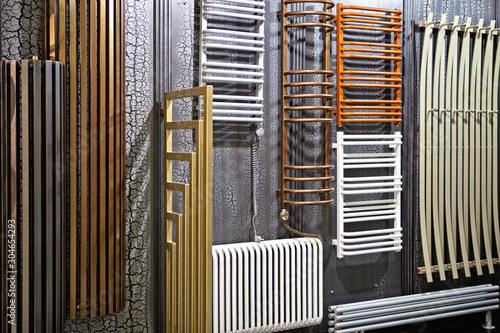 Photo Heated towel rail in the store in a large range