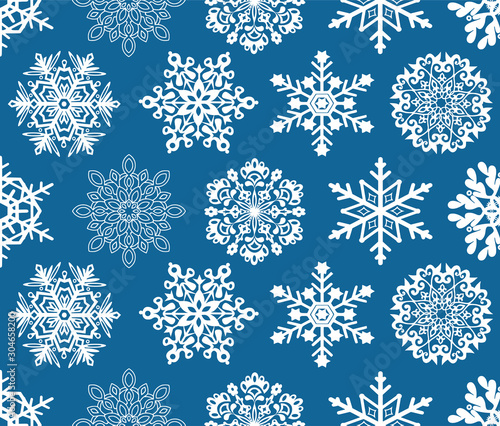 Seamless pattern of snowflakes on a background