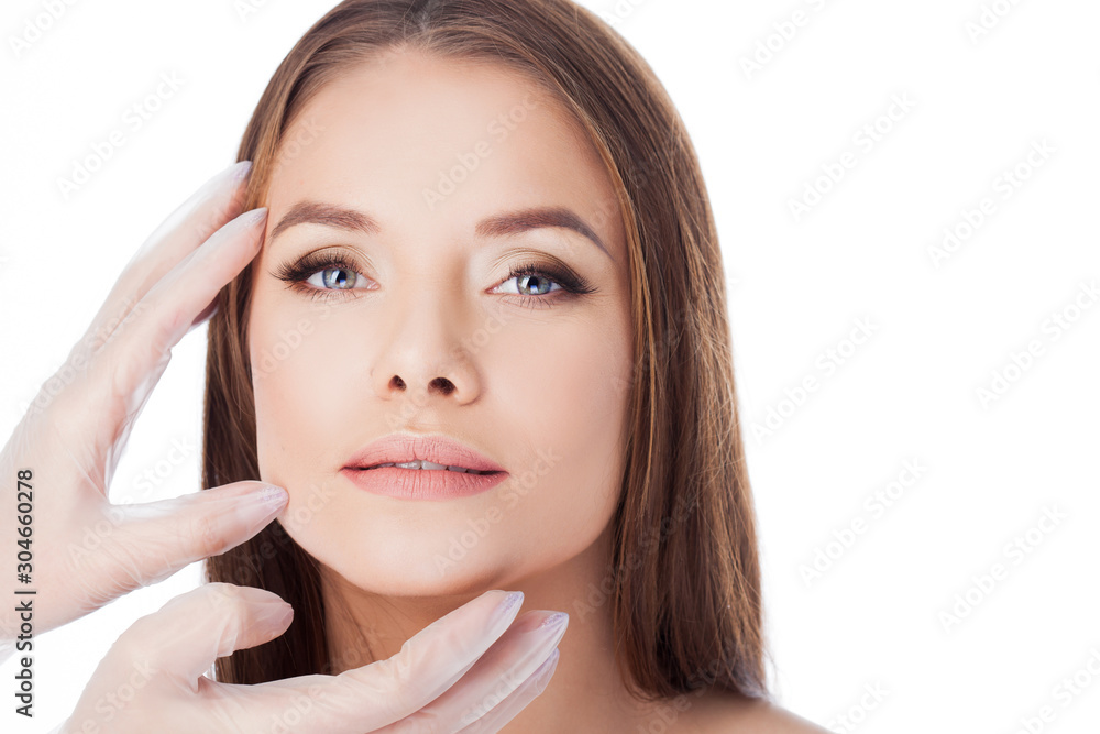 Cosmetology and aesthetic surgery. Portrait of a young attractive woman, clean skin and perfect proportions.