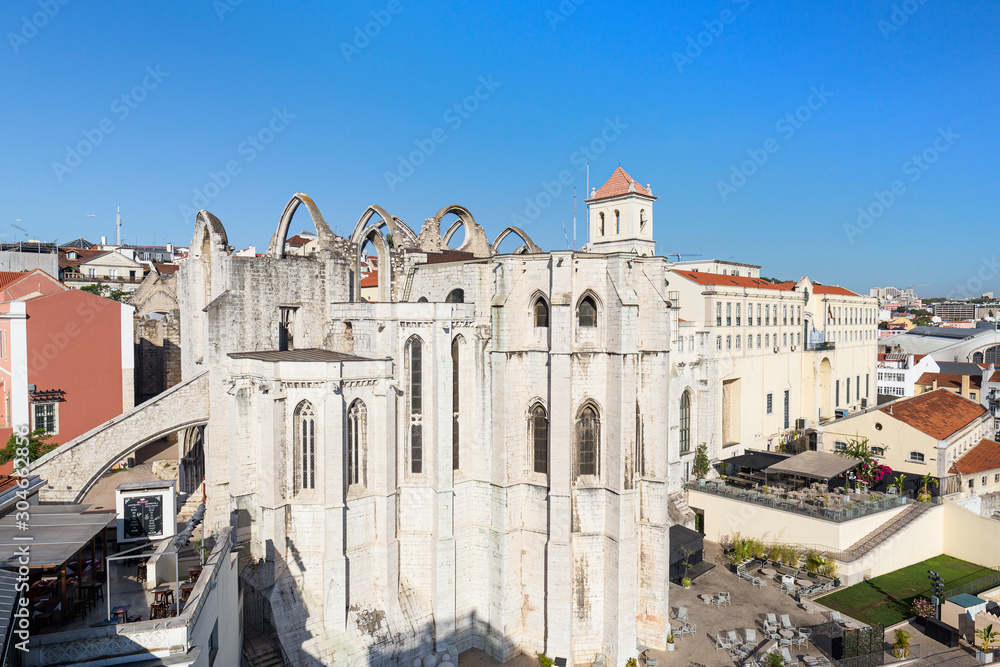 Ruins of the medieval Convento do Carmo (Carmo Convent) in Lisbon, Portugal, on a sunny day in the summer.