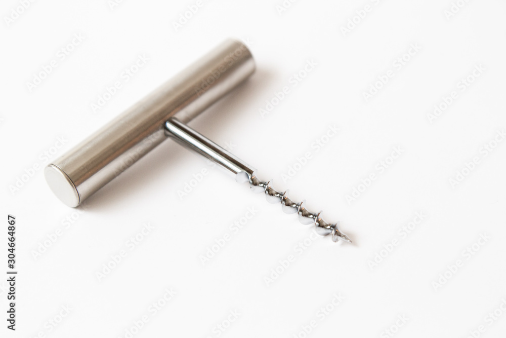 Metal corkscrew on white background. Metal corkscrew on white background.