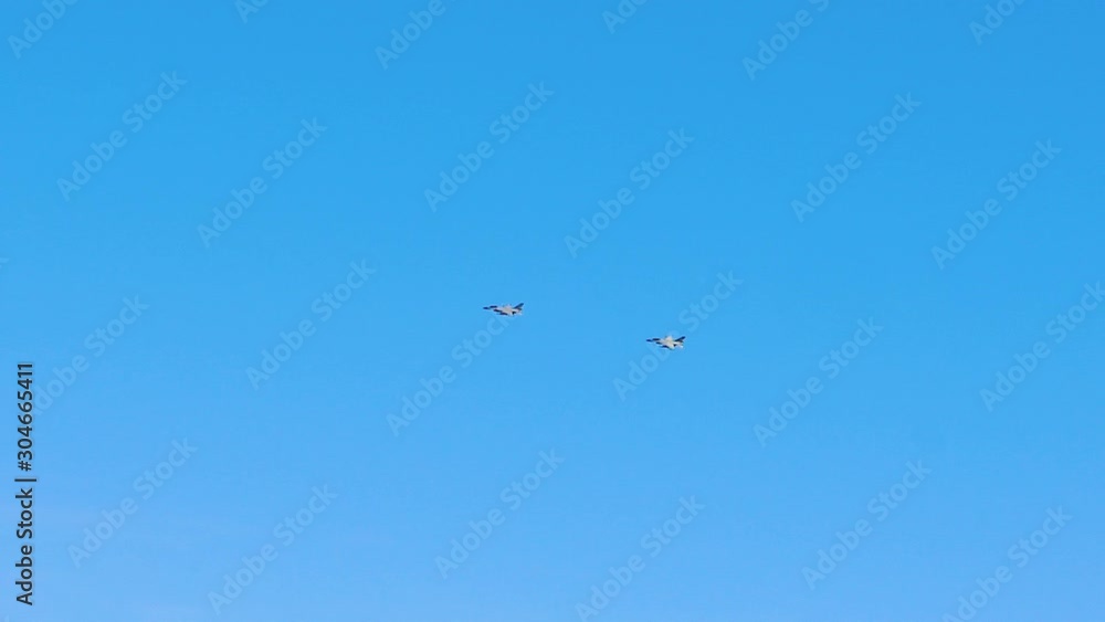 War planes flying in the blue sky. Super sonic combat modern jet. Airforce. Military. Air show. War planes flying in the blue sky. Super sonic combat modern jet. Airforce. Military. Air show.