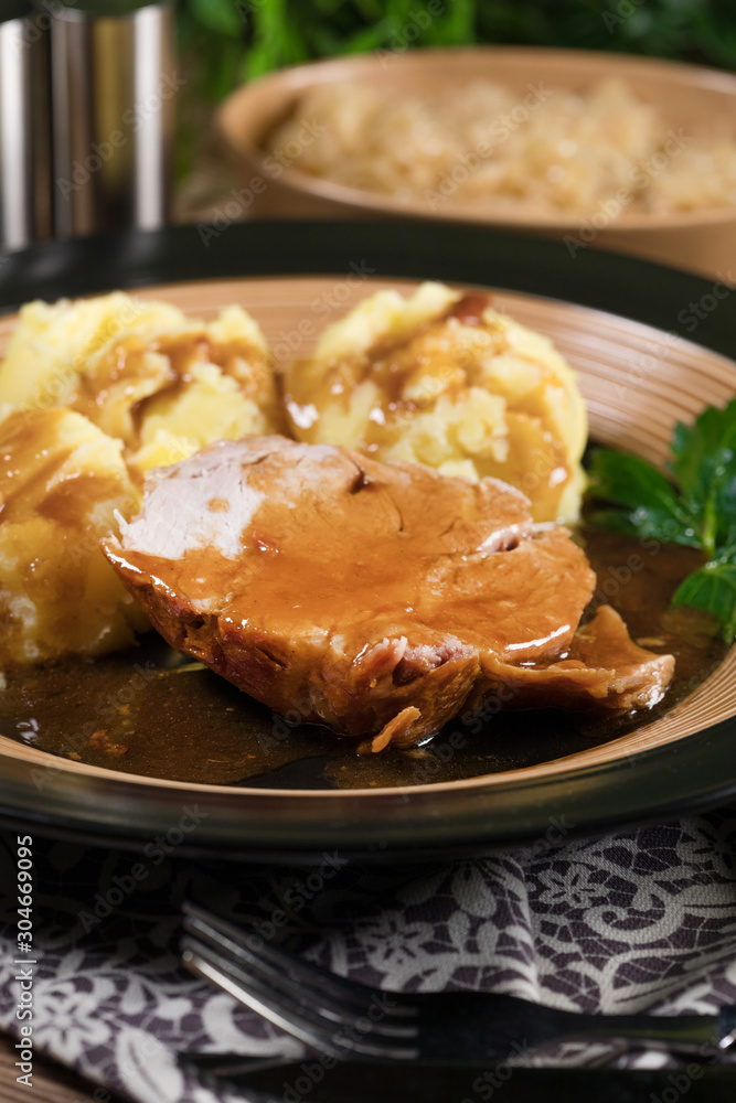 Braised pork neck in own sauce. Shallow depth of field. Braised pork neck in own sauce. Shallow depth of field.