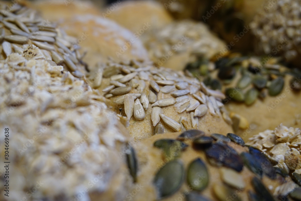 Obraz premium Close-up of bread rolls with seed. Selective focus.