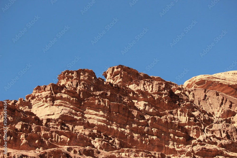 evocative wind-eroded mountains in the Wadi Rum desert