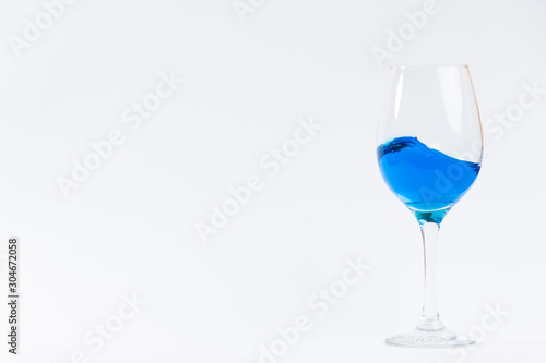 glass whith blue water