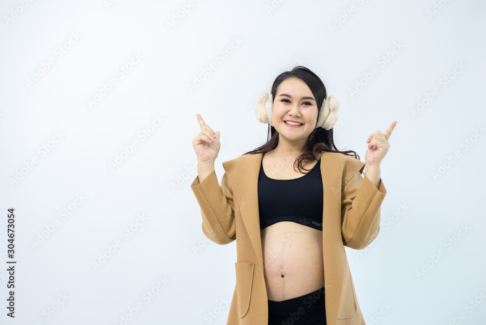 Pregnant women stand away from the white background Pregnant women stand away from the white background