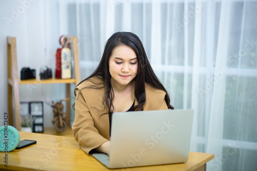 Women are playing laptops in winter