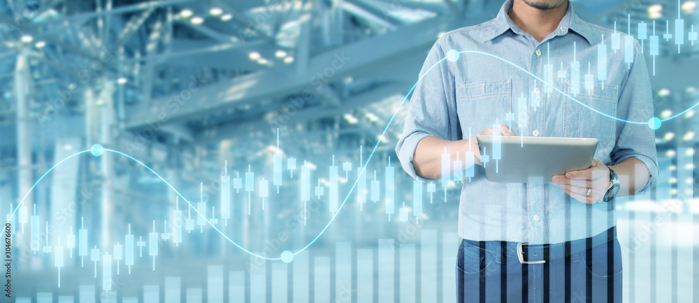 Businessman plan graph growth and increase of chart positive indicators in his business,tablet in hand Businessman plan graph growth and increase of chart positive indicators in his business,tablet in hand