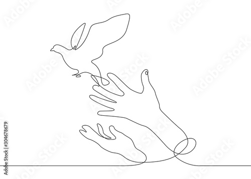 continuous line drawing bird from hand to flight photo