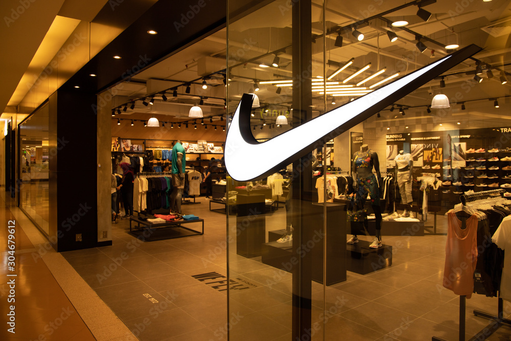 KUALA LUMPUR, MALAYSIA, April 18, 2019: Nike, Inc. is an American  multinational corporation that markets footwear, apparel, equipment,  accessories, and services worldwide. foto de Stock | Adobe Stock