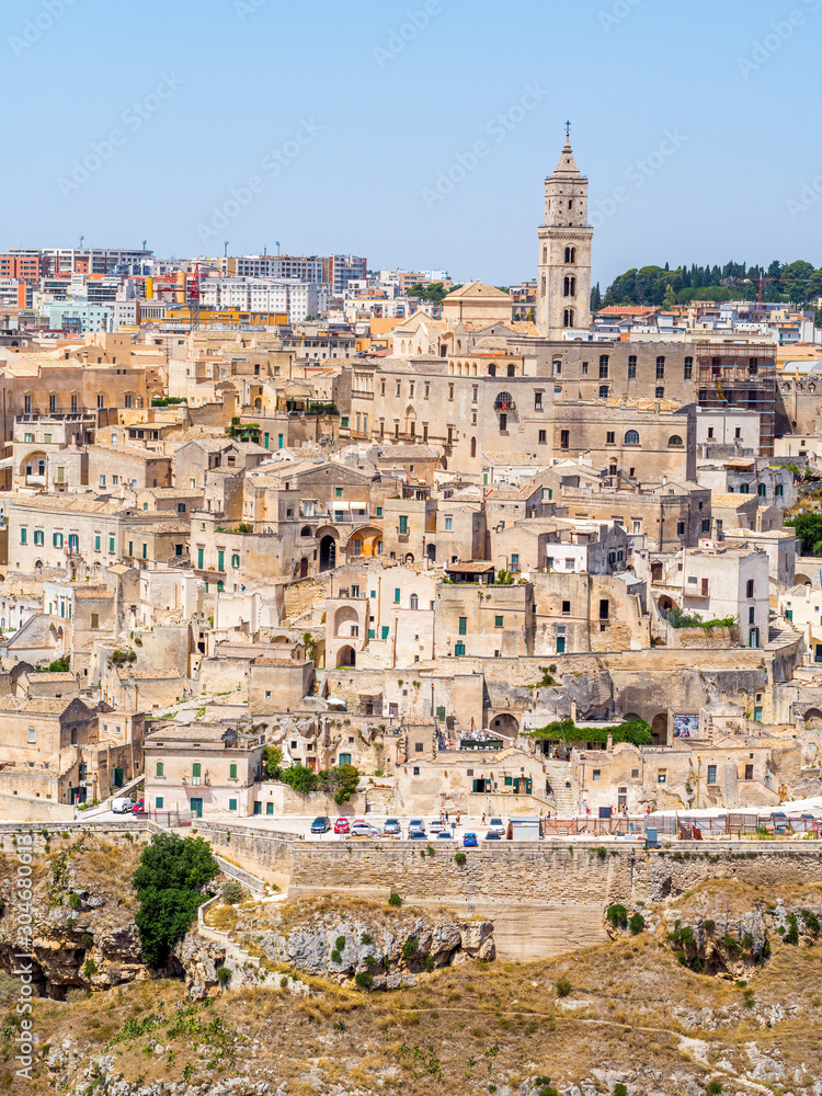 Fototapeta premium Panoramic view of the Sassi di Matera, prehistoric historic center, UNESCO World Heritage Site, European Capital of Culture 2019 (wide)