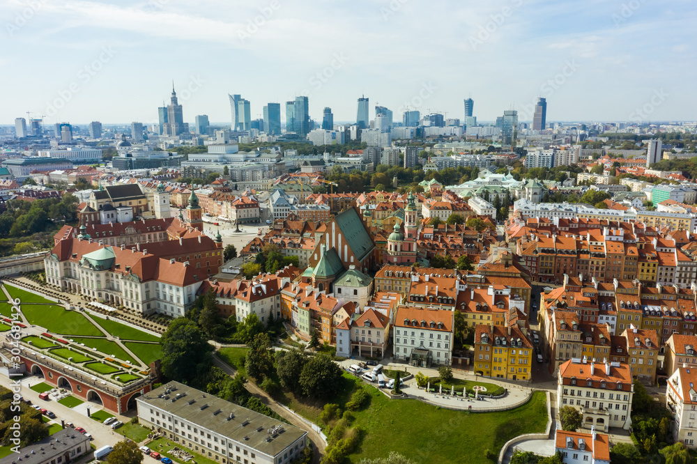Drone shot flying over city buildings in the Old Town. Drone flies over the historic center of Warsaw, Poland. 