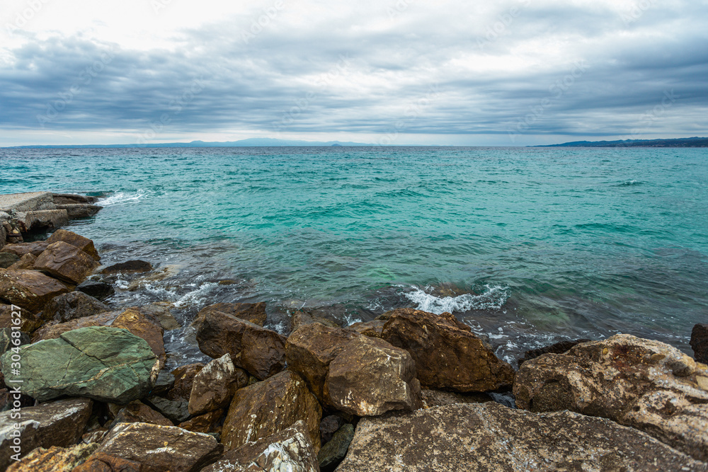 Amazing beautiful sea landscape at cloudy rainy day. Horizontal color photography.