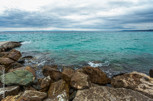 Amazing beautiful sea landscape at cloudy rainy day. Horizontal color photography.