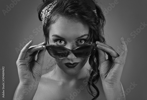 strict mistress with sunglasses