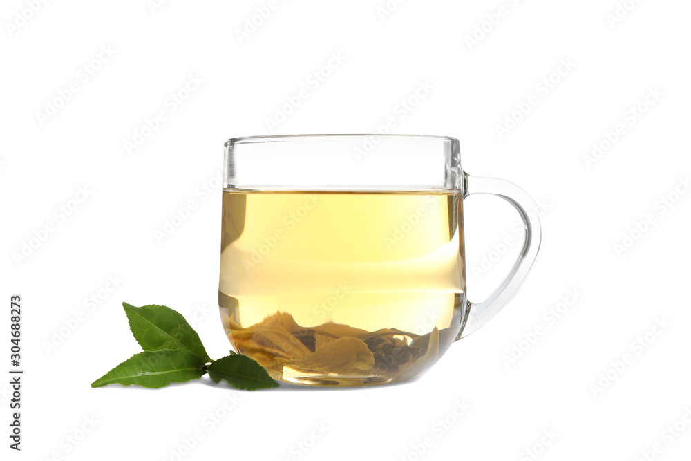 Cup of green tea and leaves isolated on white Cup of green tea and leaves isolated on white
