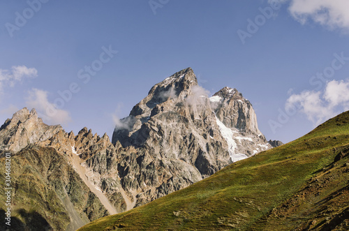 Mount Ushba, Main Caucasian ridge. Zemo Svaneti, Georgia. Autumn landscape.