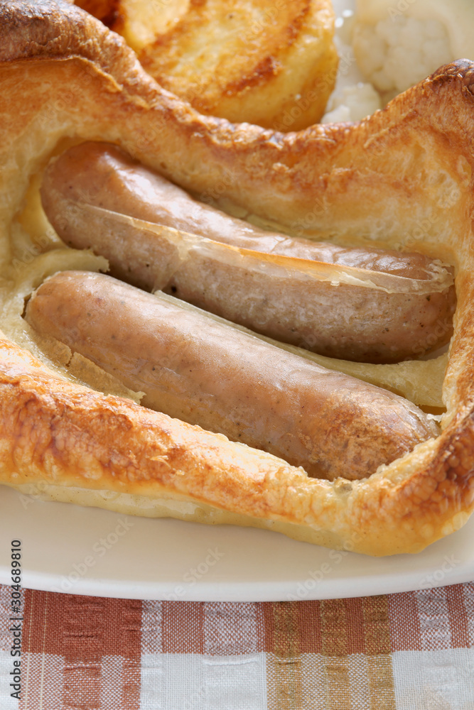 Toad in the Hole a British dish of sausages cooked in Yorkshire pudding