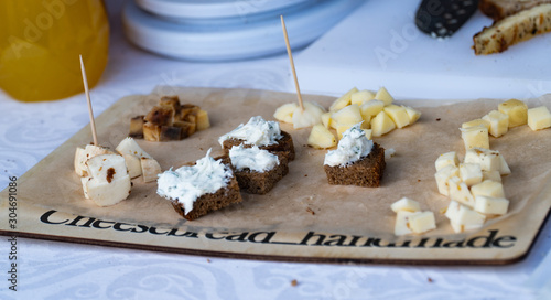 cheese on a wooden plate photo