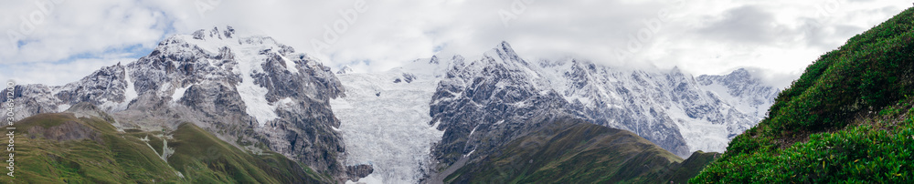Panoramic view of Mountain landscape. Mount Tetnuldi and glacier Lardaad. Ushguli, Svaneti, Georgia