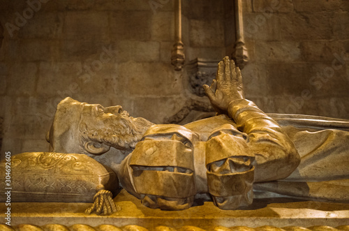 Lisbon, Portugal - July, 25th, 2018 : Tomb of navigator Vasco da Gama inside the Jeronimos Monastery, one of the most prominent examples of the Portuguese Late Gothic Manueline style.